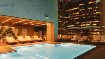 Outdoor pool, open 7:00 AM to 7:00 PM, pool loungers