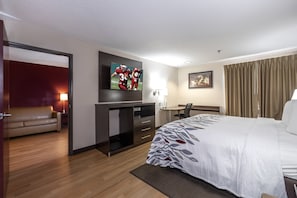 Suite, 1 King Bed (Smoke Free) | Desk, iron/ironing board, free cots/infant beds, free WiFi