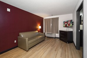 Suite, 1 King Bed (Smoke Free) | Desk, iron/ironing board, free cribs/infant beds, free WiFi