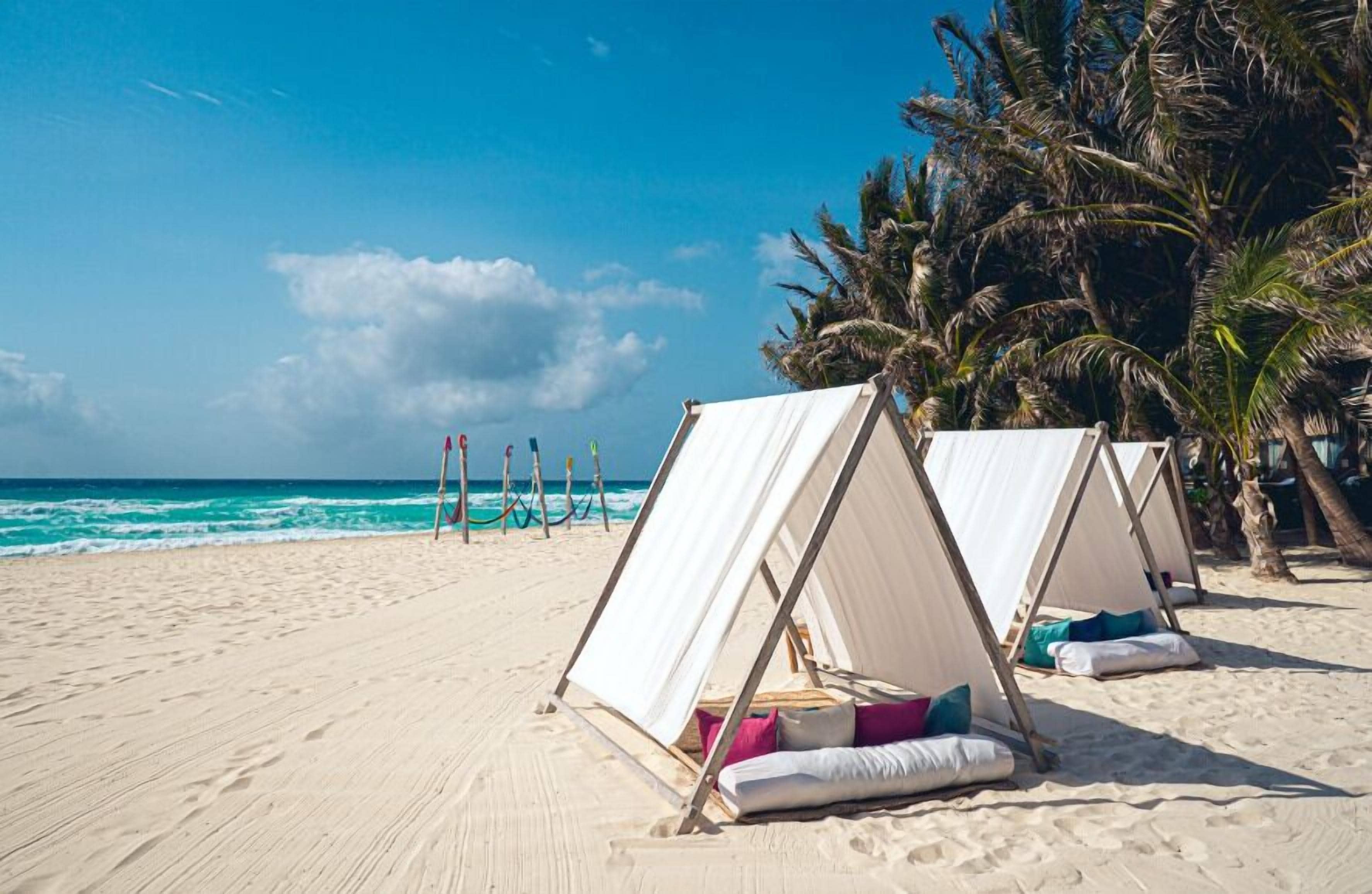 On the beach, white sand, beach towels
