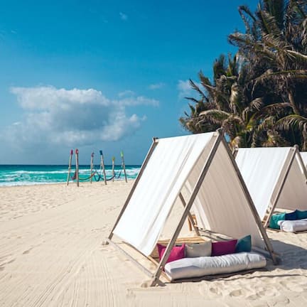 On the beach, white sand, beach towels