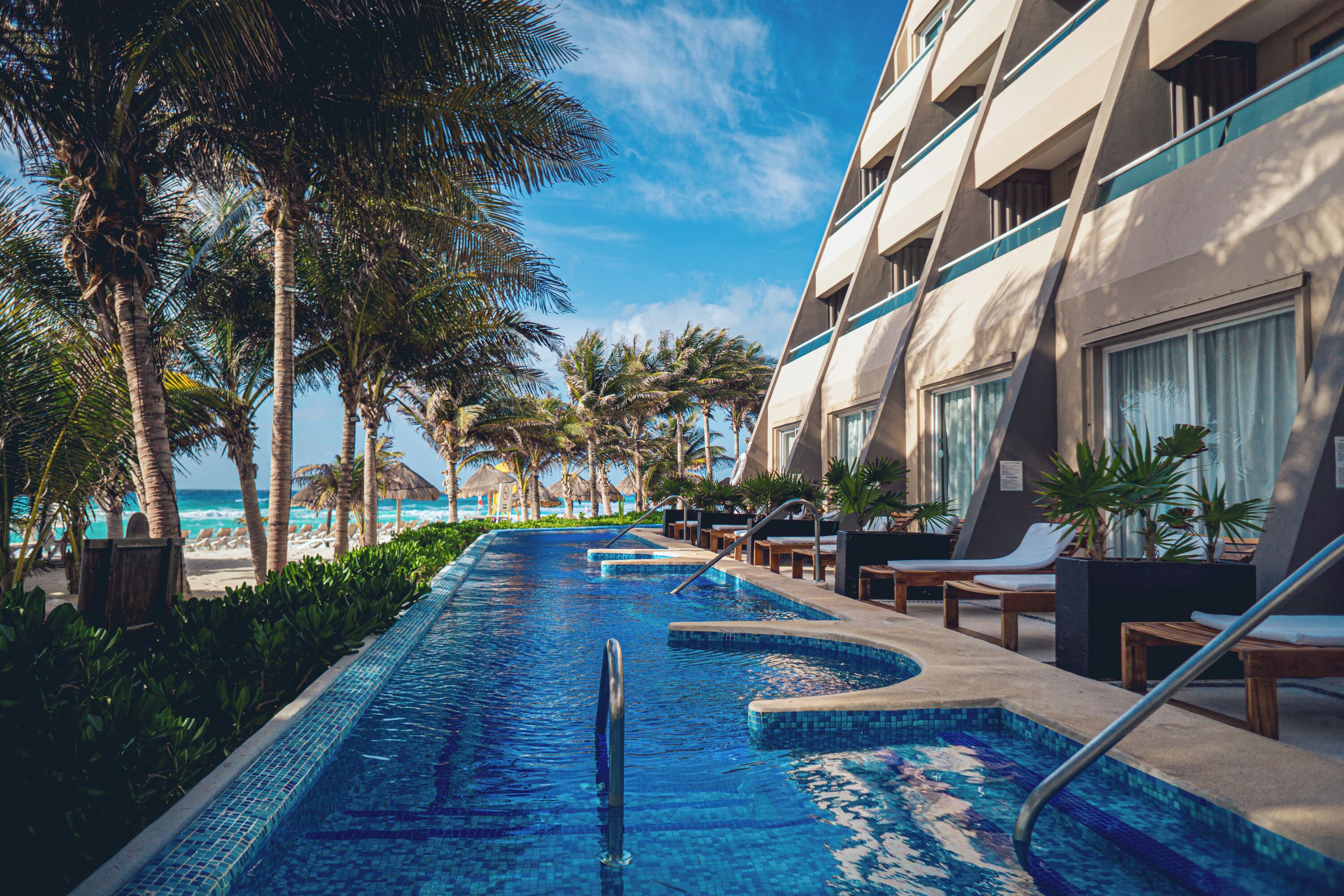 2 outdoor pools, pool umbrellas, sun loungers