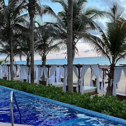 On the beach, white sand, beach towels