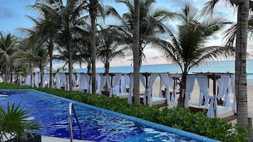 On the beach, white sand, beach towels