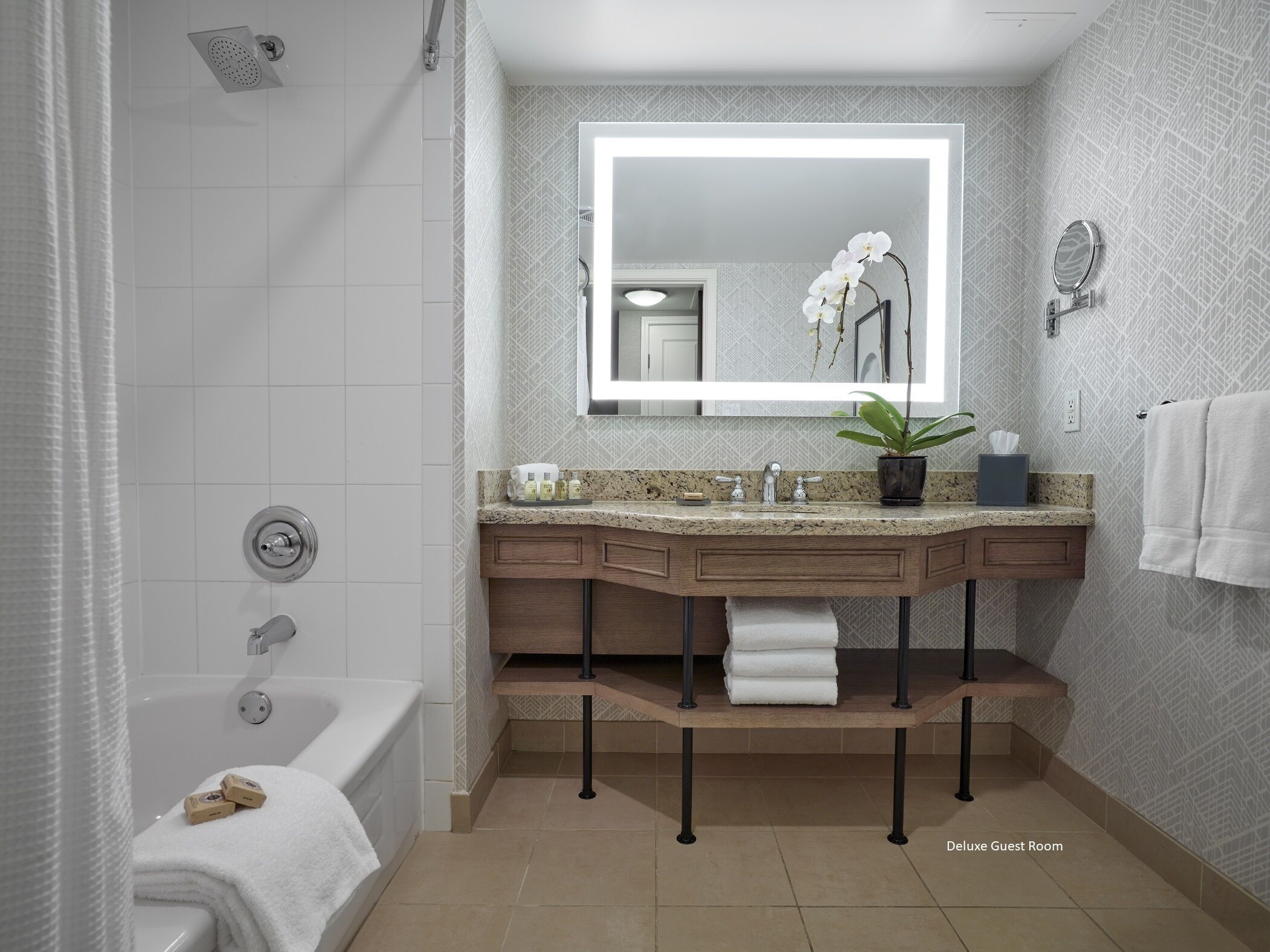 combined shower/bathtub, hydromassage showerhead, designer toiletries