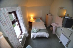 Standard Single Room, 1 Twin Bed, Shared Bathroom | In-room safe, desk, soundproofing, free WiFi