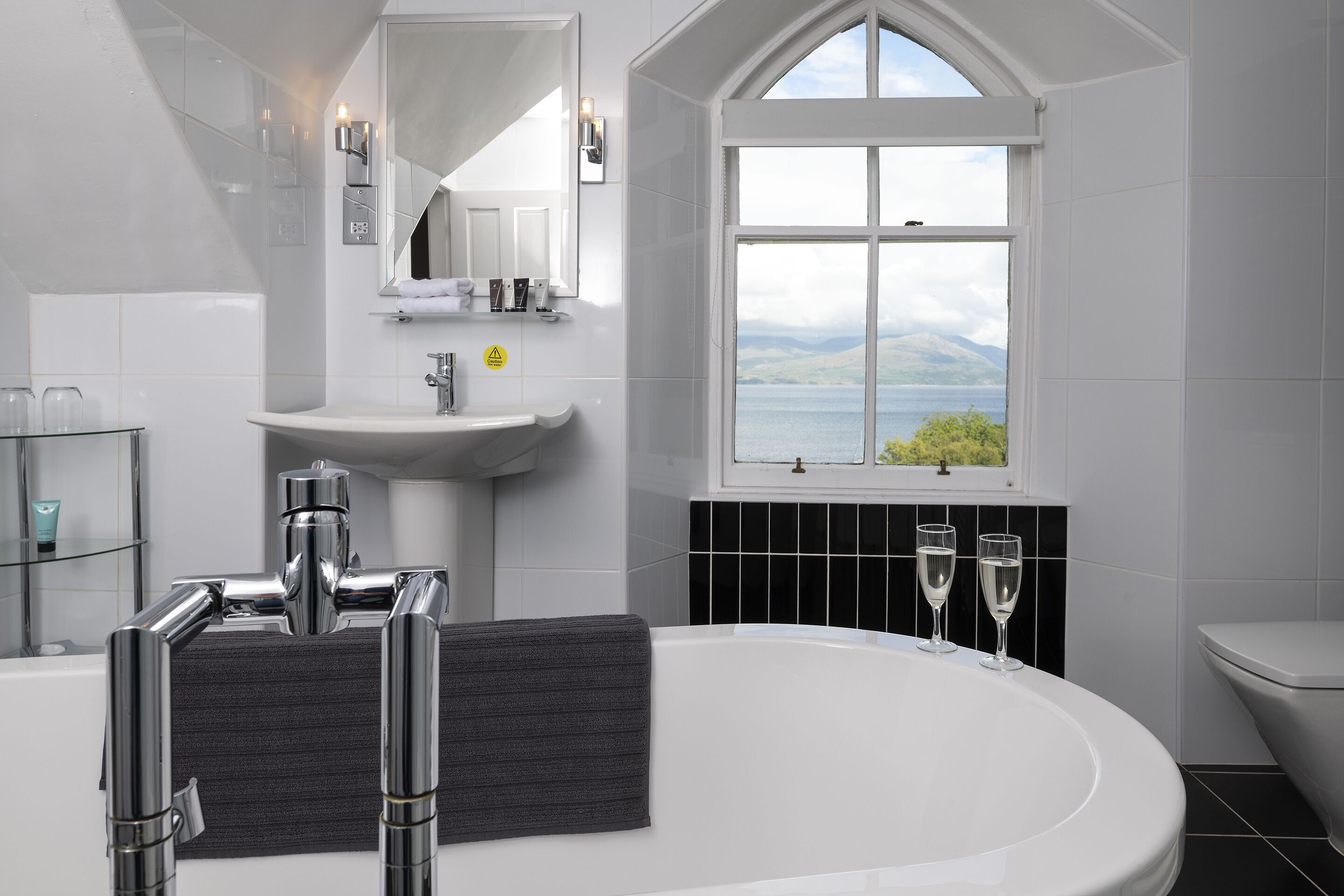 seaview deluxe | bathroom | shower, designer toiletries, hair dryer, bathrobes