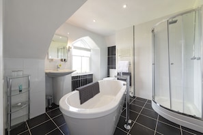 Seaview Deluxe | Bathroom | Shower, designer toiletries, hair dryer, bathrobes