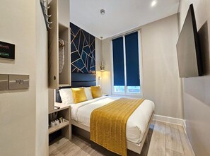 In-room safe, blackout curtains, soundproofing, iron/ironing board