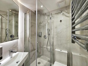 Shower, free toiletries, hair dryer, slippers