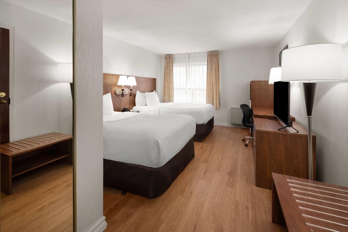 Premium bedding, desk, blackout curtains, iron/ironing board