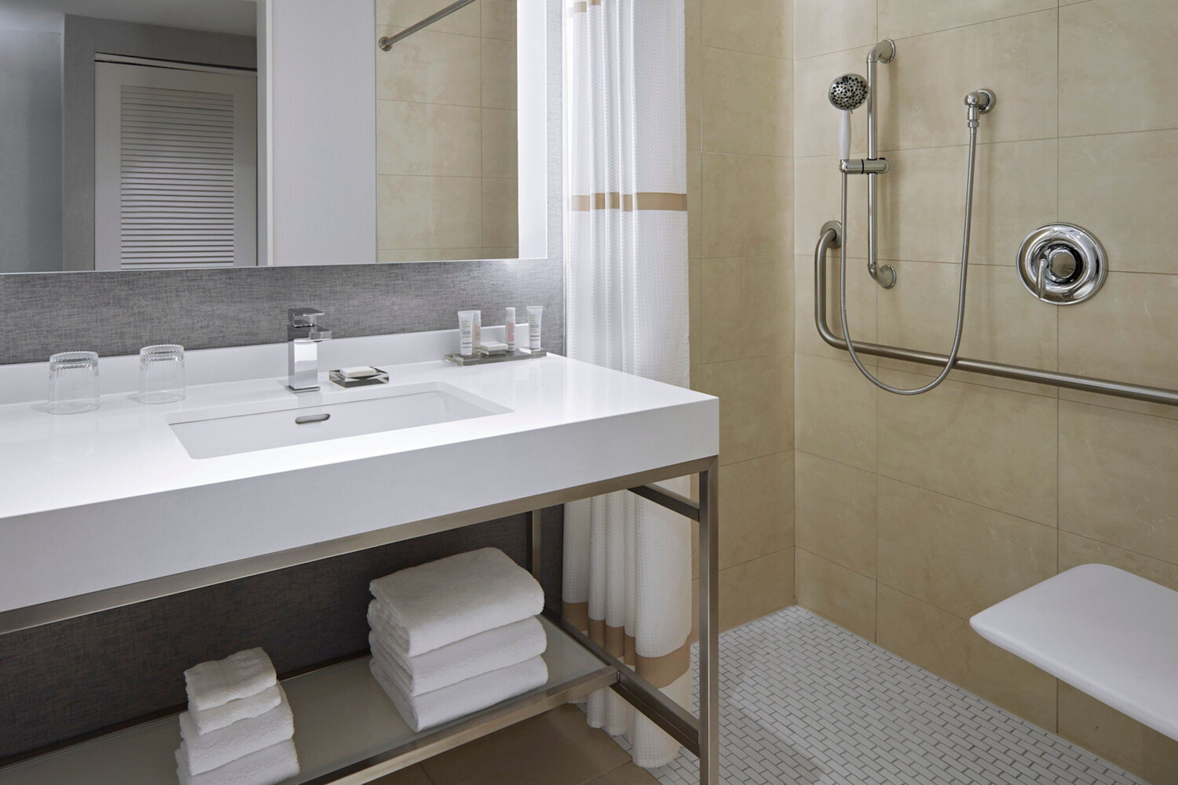 room, 1 king bed, non smoking | bathroom | designer toiletries, hair dryer, towels, soap