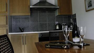 Standard Suite, 2 Bedrooms, Balcony (Suite 6) | Private kitchen | Coffee/tea maker, fridge, microwave, oven