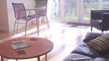 Standard Suite, 1 Bedroom, Garden View, Ground Floor (Suite 2) | Living area | 50-inch flat-screen TV with digital channels, TV, DVD player