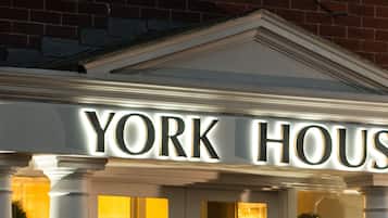 Experience the classic charm of York House Hotel, featuring a traditional facade with a symmetrical design and a distinctive pediment above the entrance.