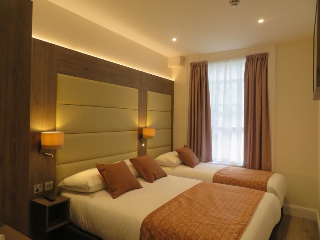 Standard Triple Room, 1 Bedroom, Private Bathroom, City View | Egyptian cotton sheets, pillow-top beds, individually decorated