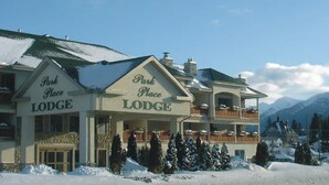 A large lodge with a prominent sign reading "Park Place Lodge." - Park Place Lodge (Fernie)