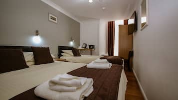 Family Room, Shared Bathroom | 1 bedroom, individually decorated, desk, blackout drapes