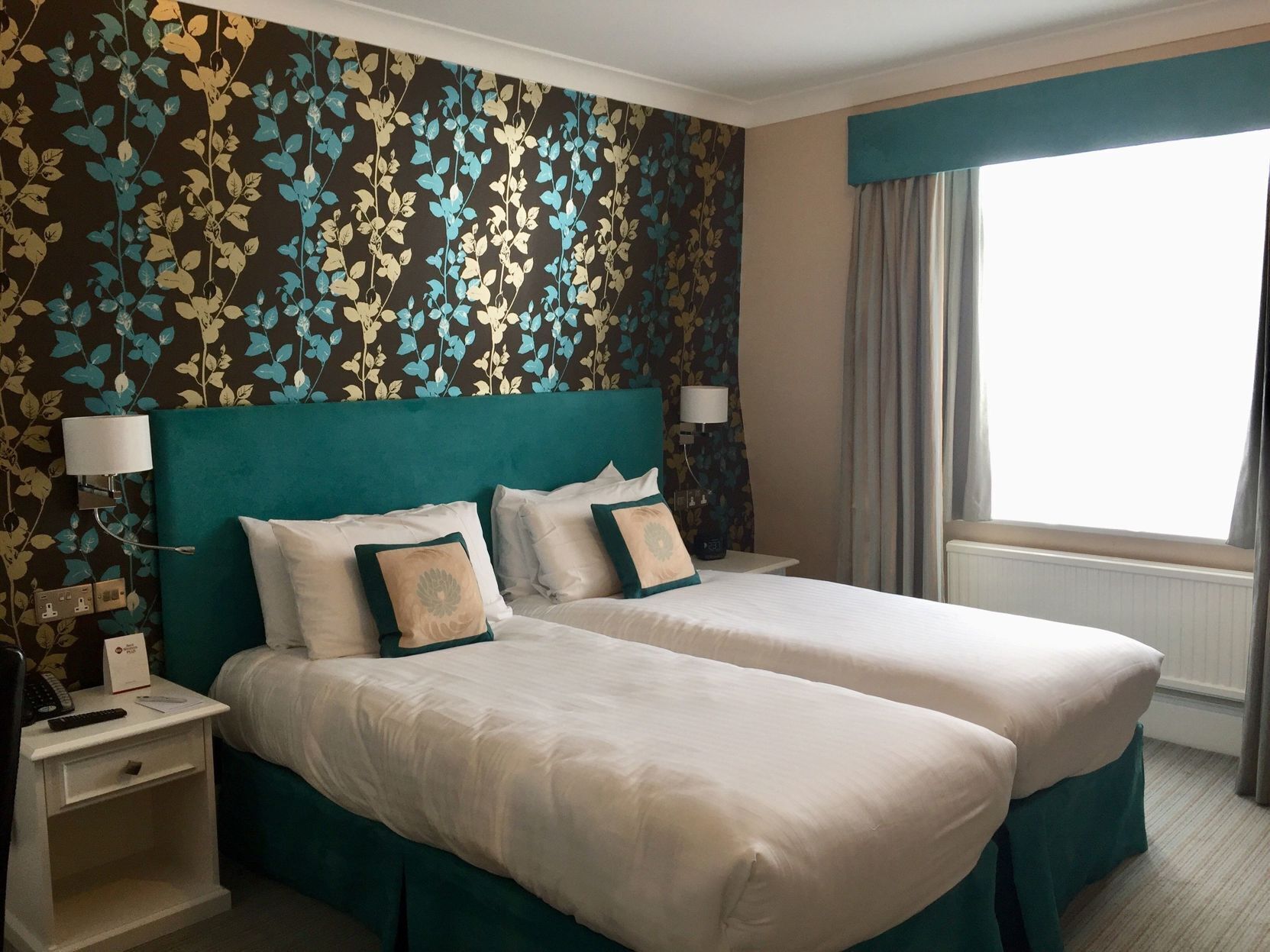 Premium bedding, in-room safe, individually decorated