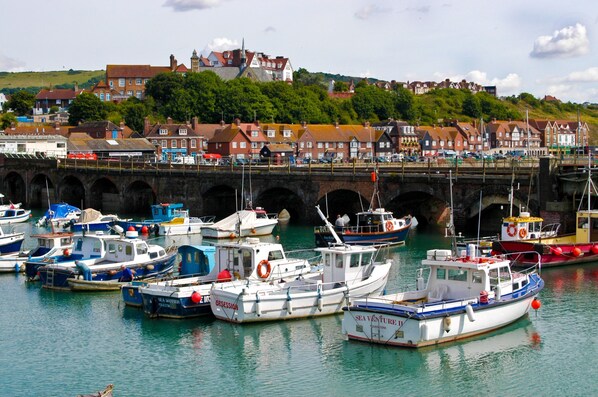 A harbor with boats docked, a bridge, and buildings in the background. - Burlington Hotel, Best Western Premier Collection (Folkestone)