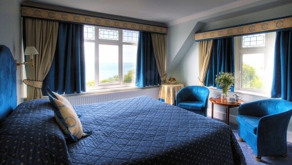 Premium bedding, in-room safe, individually decorated