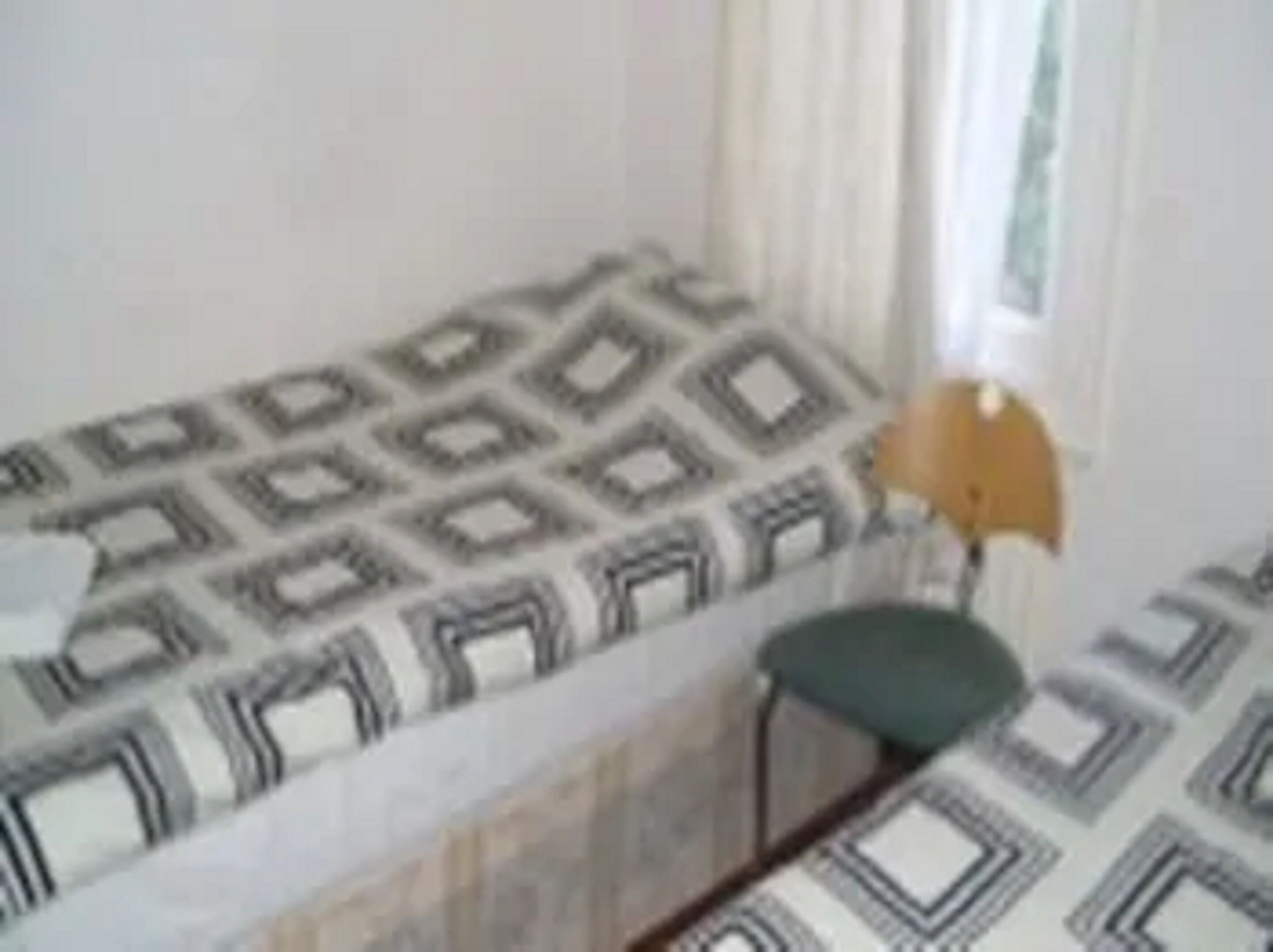 ستائر تعتيم ومكواة/لوح كي وواي فاي مجانًا وملاءات أسرّة