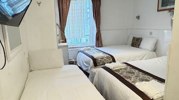Familiekamer | Een strijkplank/strijkijzer, gratis wifi, beddengoed