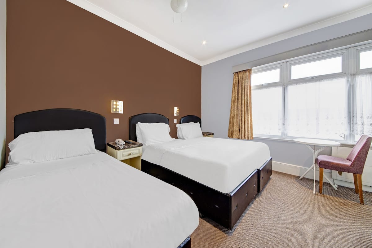 Standard Triple Room, Multiple Beds | Iron/ironing board, free WiFi, bed sheets