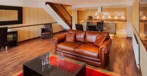 Apartment | Living area | 50-inch TV with digital channels