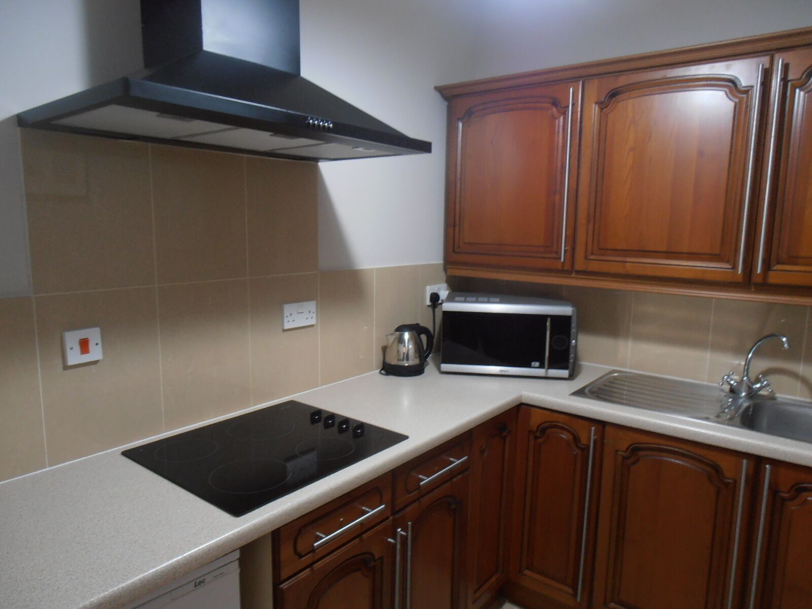 fridge, coffee/tea maker, electric kettle, dining tables