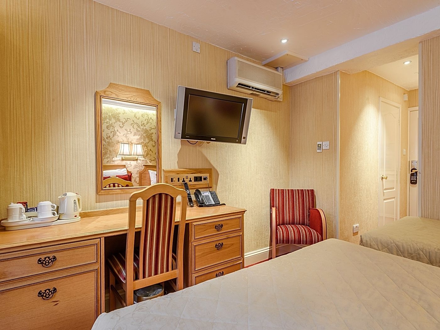 family room | 1 bedroom, minibar, in-room safe, desk