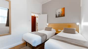 Twin Room | Desk, blackout curtains, free cots/infant beds, free WiFi