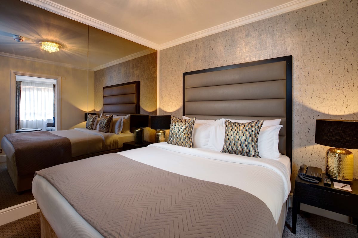 Suite, 1 King Bed | 1 bedroom, hypo-allergenic bedding, in-room safe, desk