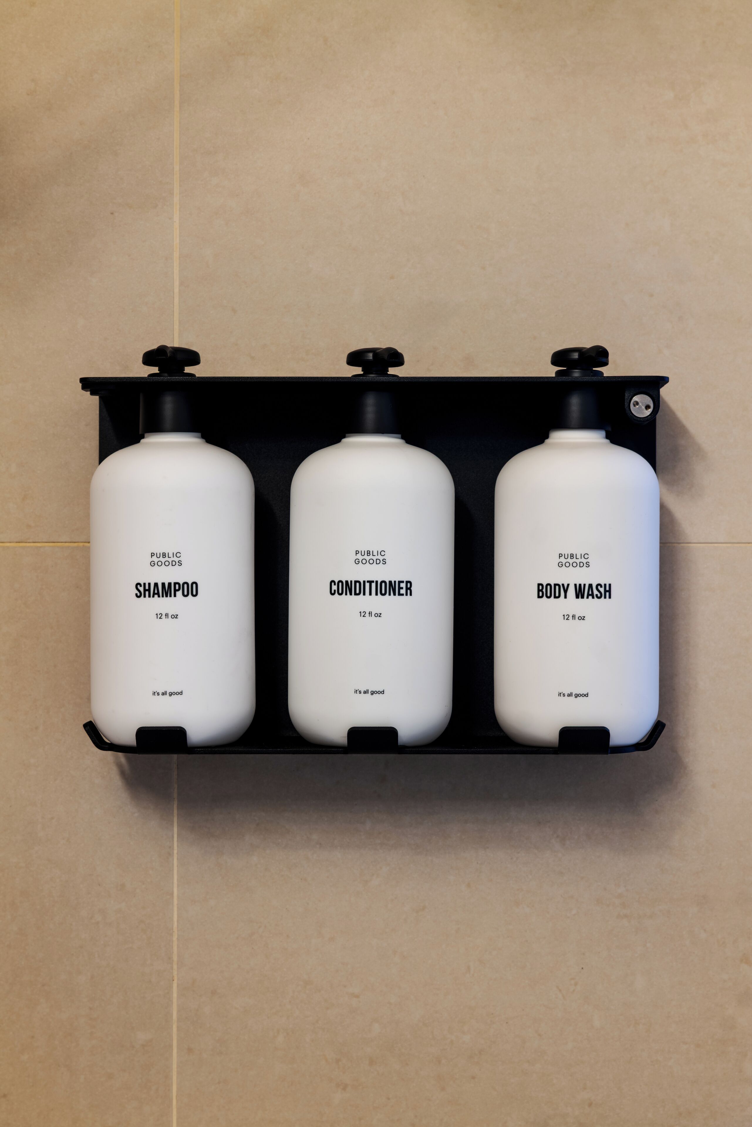 designer toiletries, hair dryer, towels, soap