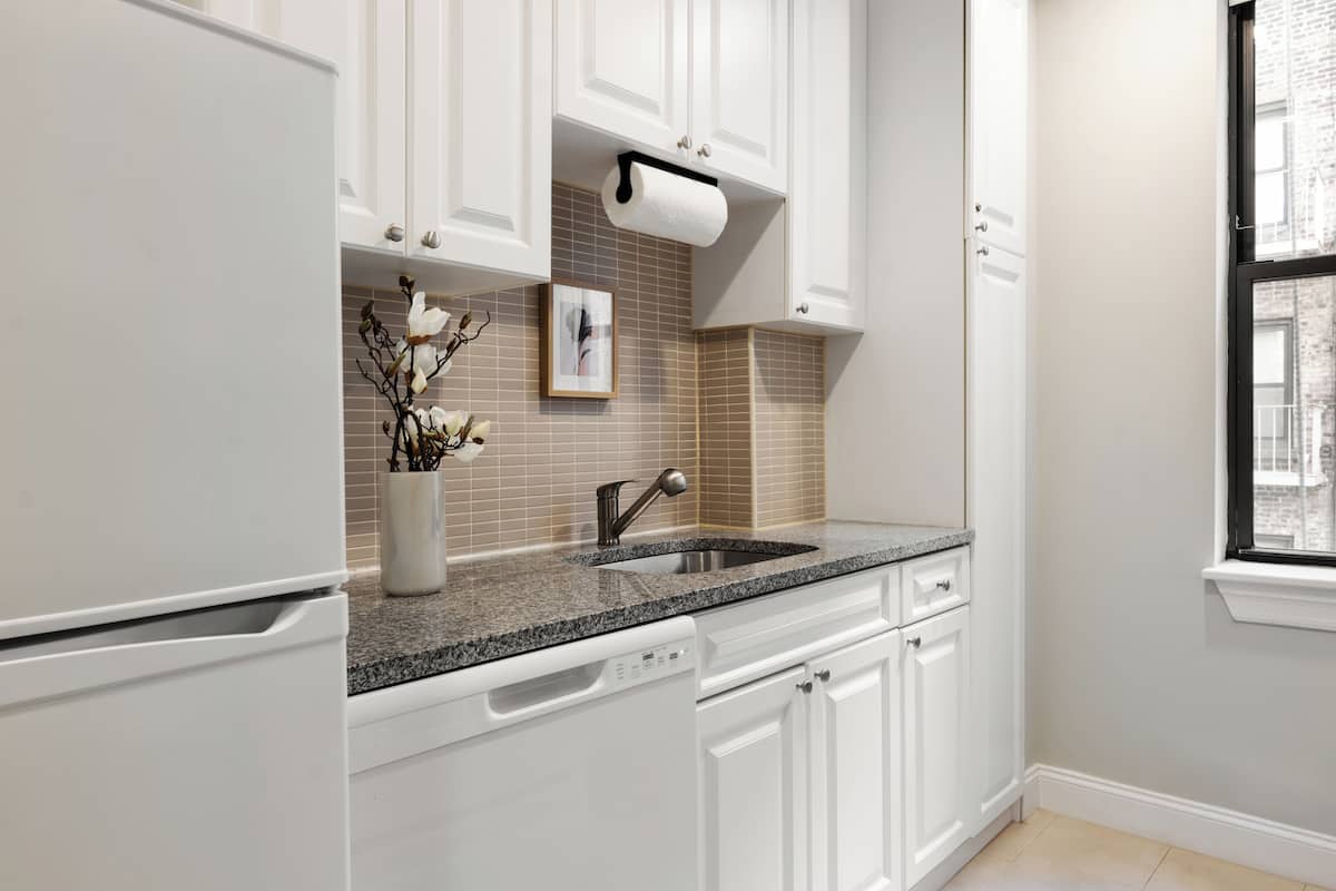 fridge, microwave, coffee/tea maker, cookware/dishes/utensils