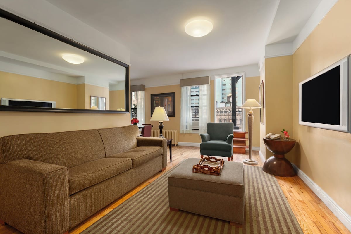 Penthouse, 1 Bedroom | Living area | LCD TV, DVD player, iPod dock