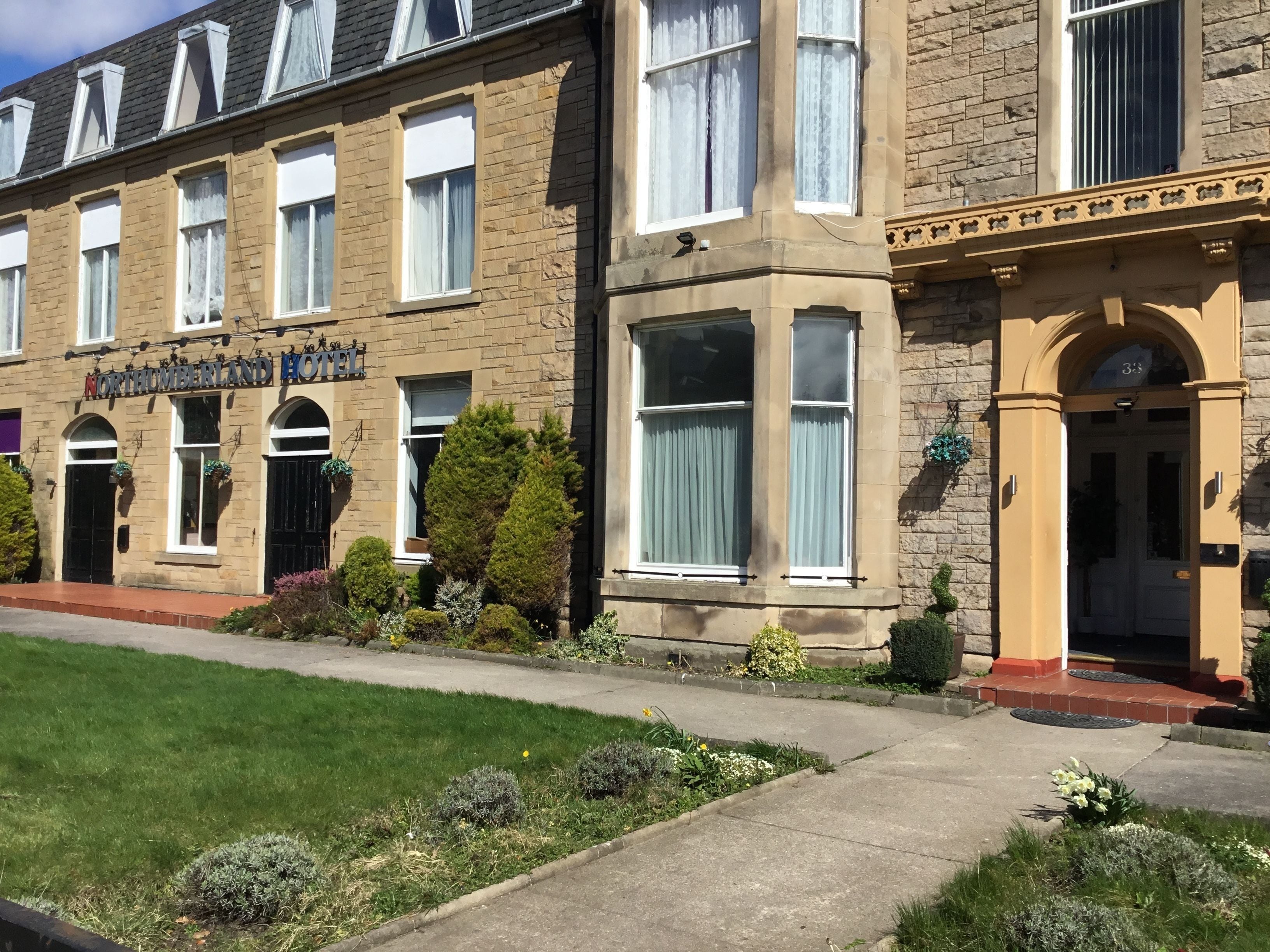 A two-story building with a sign reading "Northumberland Hotel".