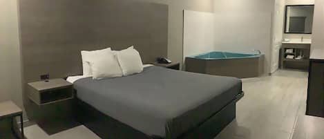 Suite, 1 King Bed, Non Smoking | Desk, iron/ironing board, free WiFi, bed sheets