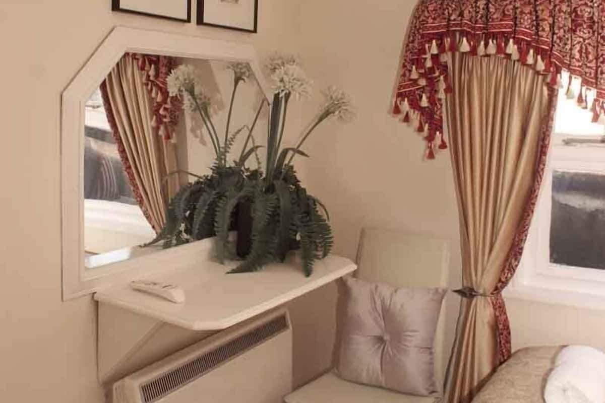 Standard Double Room | Living area | TV