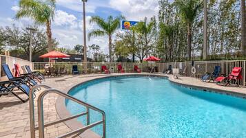 Outdoor pool, open 8:00 AM to 10:00 PM, pool umbrellas, pool loungers
