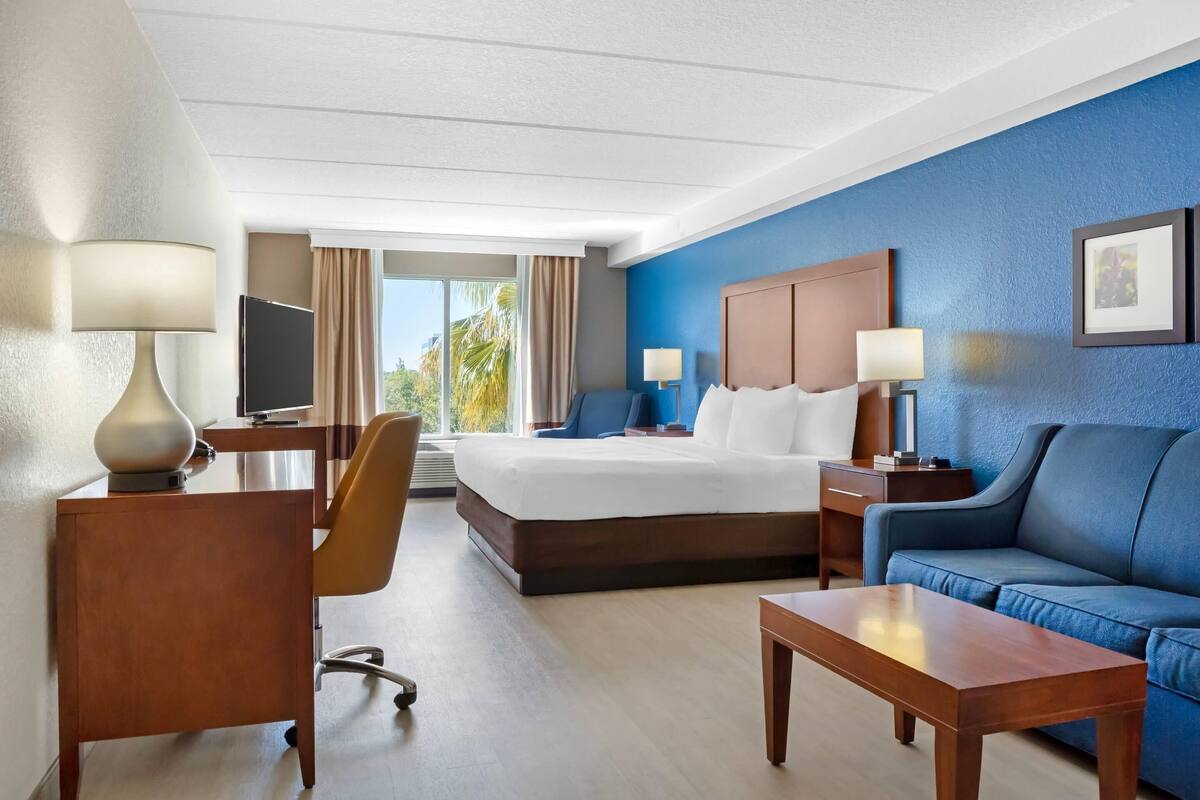 suite, 1 king bed, non smoking | desk, laptop workspace, blackout curtains, iron/ironing board