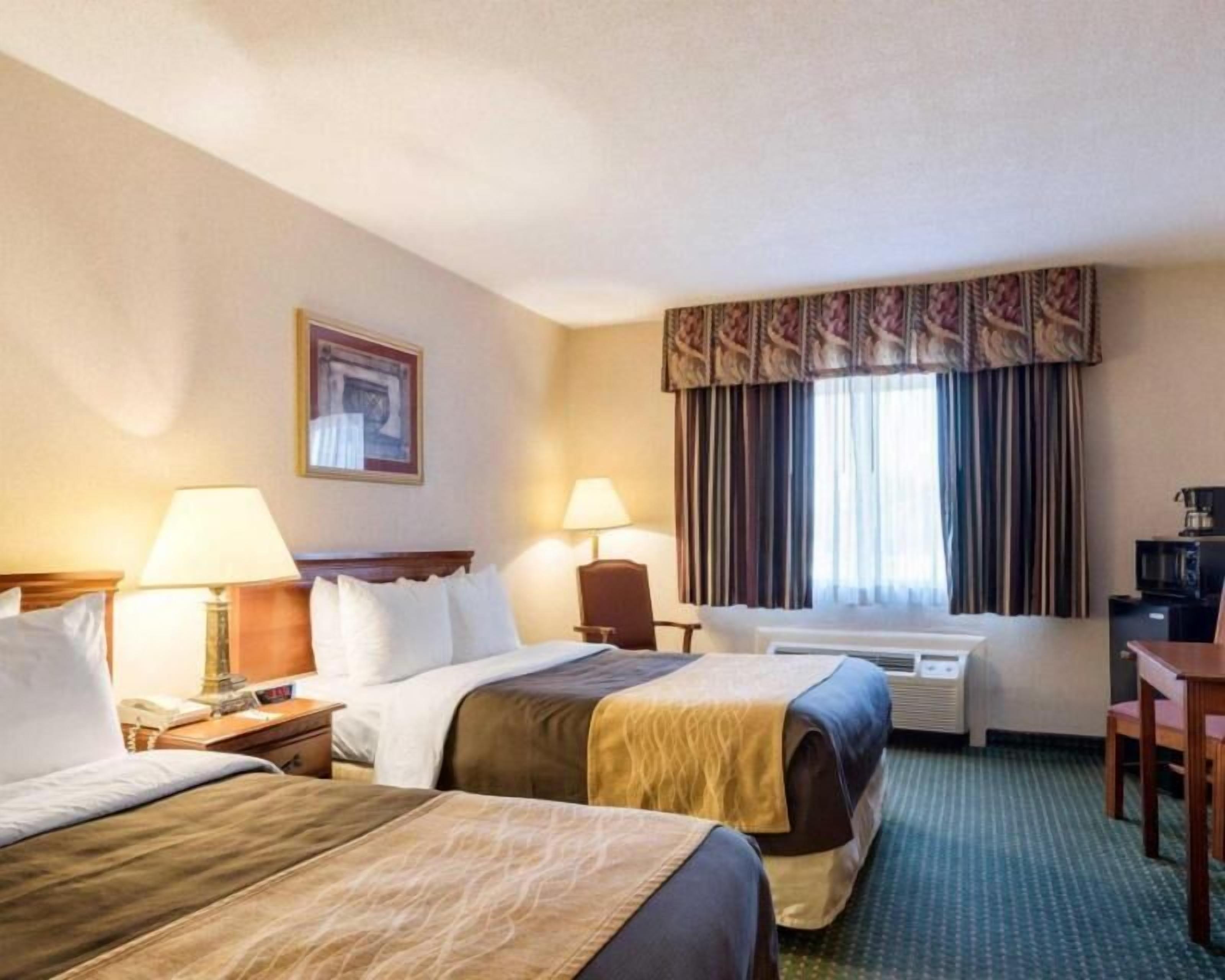 Premium bedding, down comforters, memory foam beds, desk