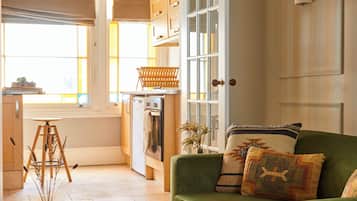 Apartment | Living area | 32-inch flat-screen TV with digital channels
