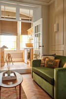 Apartment | Living area | 32-inch flat-screen TV with digital channels