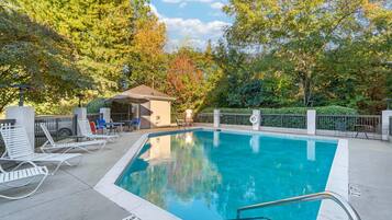 Seasonal outdoor pool, open noon to 8:00 PM, pool loungers