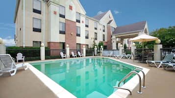 Seasonal outdoor pool, open noon to 8:00 PM, pool loungers