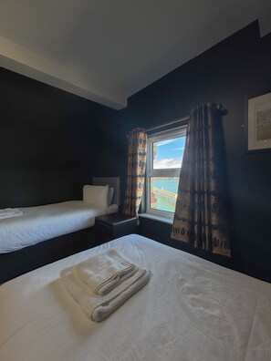 Triple Room | 1 bedroom, in-room safe, individually decorated, individually furnished