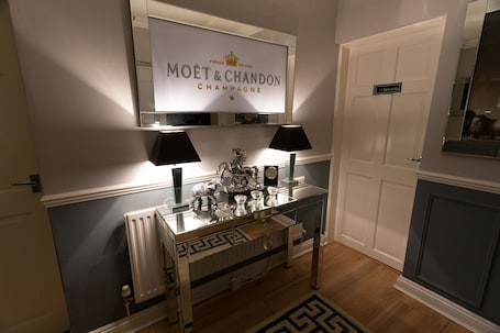 Individually decorated, individually furnished, desk, iron/ironing board. The Ascott
