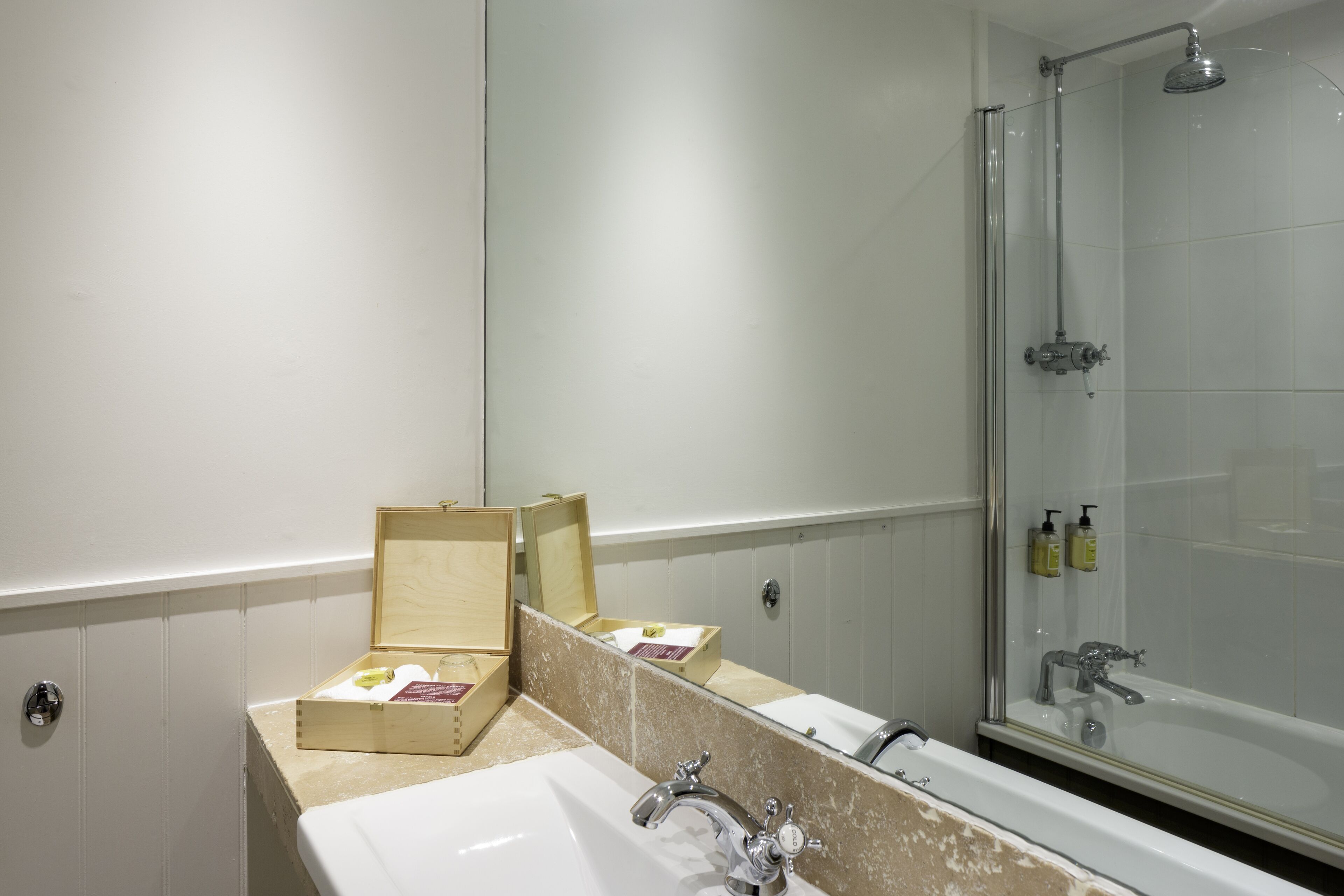 combined shower/bathtub, free toiletries, hair dryer, towels