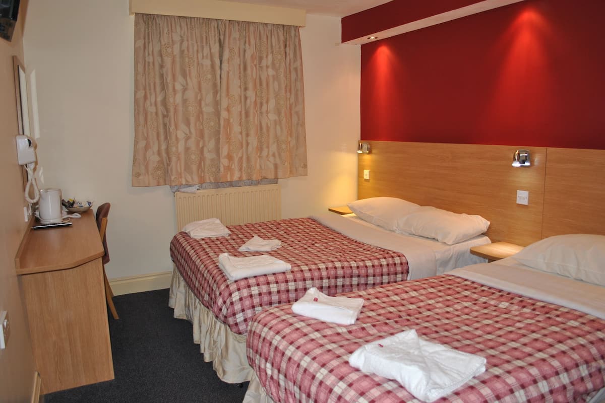 Pillow-top beds, in-room safe, desk, WiFi